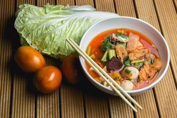 Noodles with seafood soup and red  or 