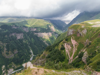 Fototapeta premium Beautiful green mountains in the clouds
