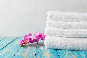 Fototapeta na wymiar towels with orchid flower