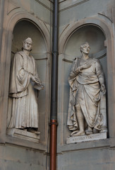 F. Guicciardini and Amerigo Vespucci. Statues in the Uffizi Gallery, Florence, Tuscany, Italy