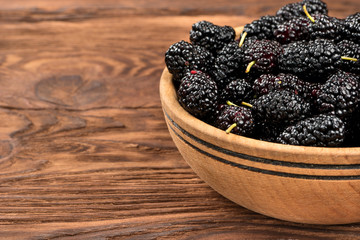 Black mulberries in bowl