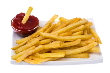 French fries and ketchup on white background