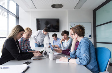 Group of young people meeting in startup office
