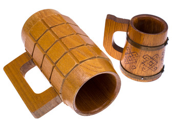 Antique vintage wooden mug for beer on white background