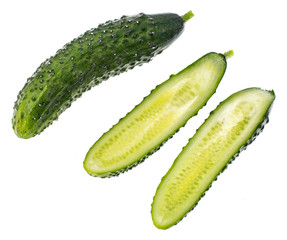 Green fresh cucumber whole and cut in half in vegetarian diet