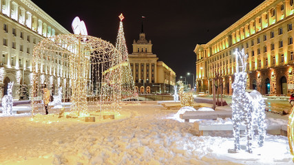 Beautiful night view in downtown Sofia Ministerial Council, the National Assembly and the presidency with Christmas decorations. Bulgaria - obrazy, fototapety, plakaty