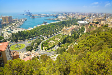 Cityscape panoramic aerial view of Malaga with bullring and harbor. Port of malaga, alcazaba castle and the cathedral of malaga. Spain.