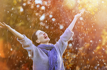 woman under the autumn shower