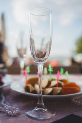 Empty glass of wine on the table.
