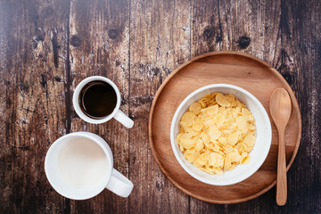 Time to breakfast with milk coffee and corn flakes