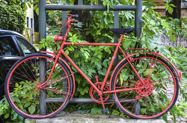 Fototapeta na wymiar A bicycle as a street decoration in Erfurt, Germany
