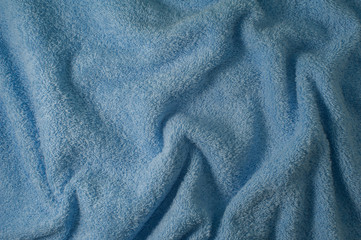 Fototapeta na wymiar texture of blue towel for a background