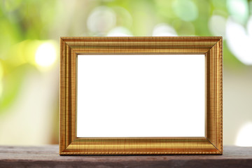 Modern Picture Frame placed on a wooden floor.