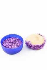 Sweet alfajor and dragees.