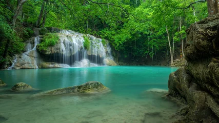  Wonderful green waterfall at deep forest, Erawan waterfall located Kanchanaburi Province, Thailand © peangdao