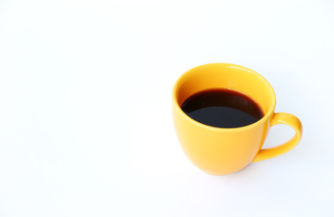 Hot coffee In yellow cup White background.with space for your text
