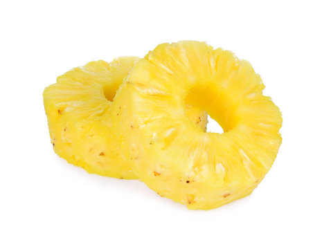 Two Slices of Fresh pineapple, Donut shapes, Canned pineapple, isolated on white background.