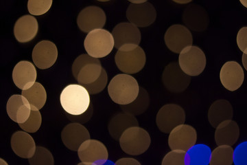 Abstract background of out of focus lights at night. Light hexagon.