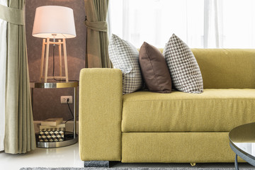 set of pillows on modern sofa in modern living room