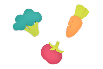 Carrot, broccoli and tomato paper cut on white background - isolated