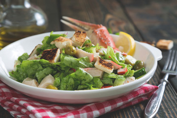 Salad of crabs and fresh vegetables