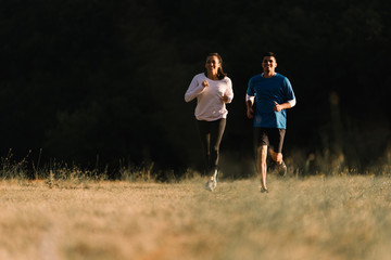 Woman winning in a race against her partner