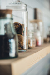 fresh cookies in glass jar on shelf
