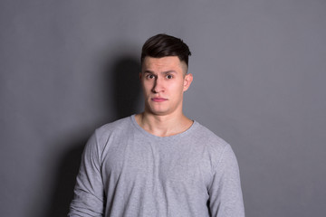 Fototapeta premium Negative human emotion, man expressing annoyance