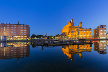 Fototapeta na wymiar Awesome Water Reflections at Illuminated Inner Harbor/ Duisburg