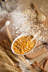 Cake making equipment. wooden rolling pin and Various wooden on brown table