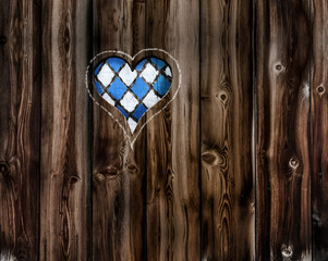 Weiß Blaues Herz in Holzwand