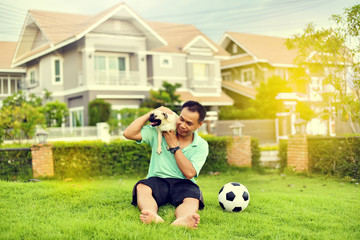 Happy Asian man with dog

