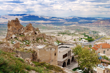 Uchisar castle in rock formation. Cappadocia. Nevsehir Province. Turkey