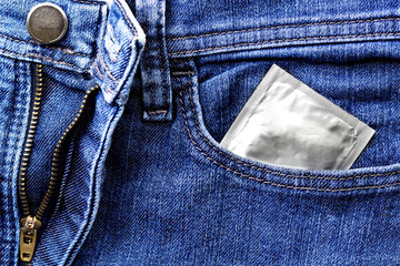 Condoms in the blue jeans pocket
