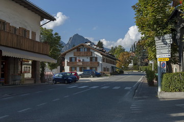 Autumnal corso Italia, the residential district in the town Cortina d'Ampezzo with mountain, Dolomite, Alps, Veneto, Italy, Europe