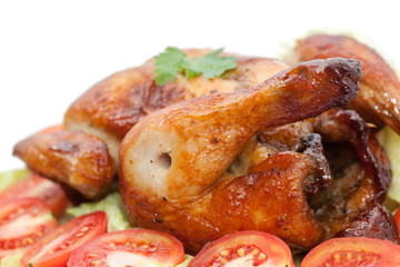 close up roast chicken on wooden plate  isolated on white