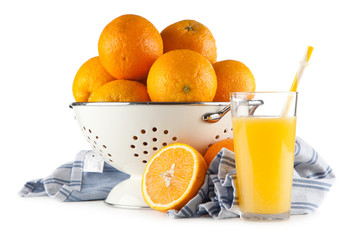 Fresh oranges in a colander