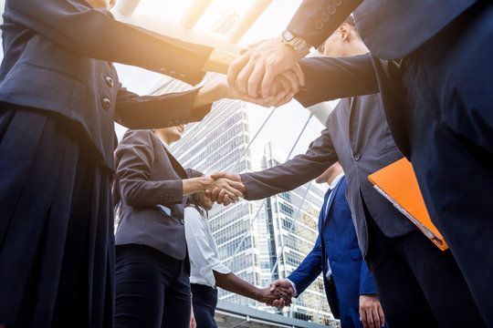 group of hand shake from business peoples after agreement