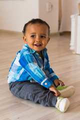 Naklejka premium Happy Mixed Race Toddler Boy