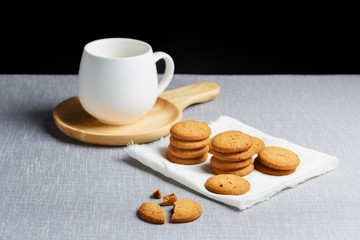 cookies and milk on gray cloth background