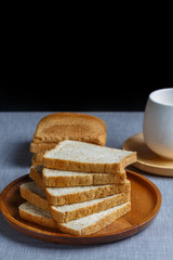 Whole Wheat Bread and milk on gray cloth