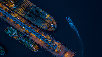 Aerial view of oil tanker ship at the port.