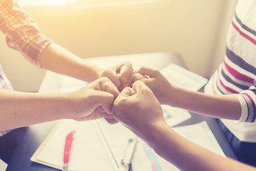 Business Partners Giving Fist Bump to Greeting Start up Team project with Contractor. Corporate Teamwork Partnership in Office Meeting. Businesspeople with Hands together.Success Business Concept.
