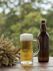 Beer glass on a wooden board.