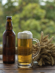 Beer glass on a wooden board.