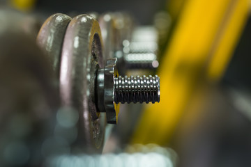 Close up of Heavy sports dumbbells in modern sports club