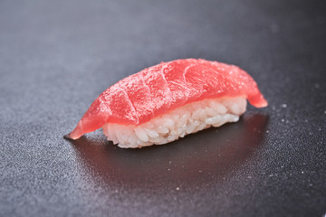 sushi on the black background