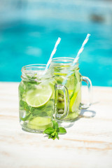 Detox with Cucumber, kiwi and lime around the pool