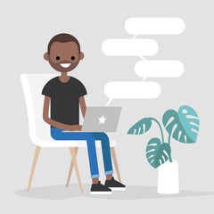 Young black character typing messages on a laptop. Remote communication. Modern lifestyle. Copy space. Flat editable vector illustration.