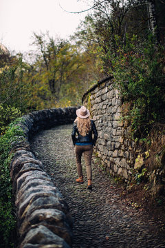 woman walking on the ild bridge